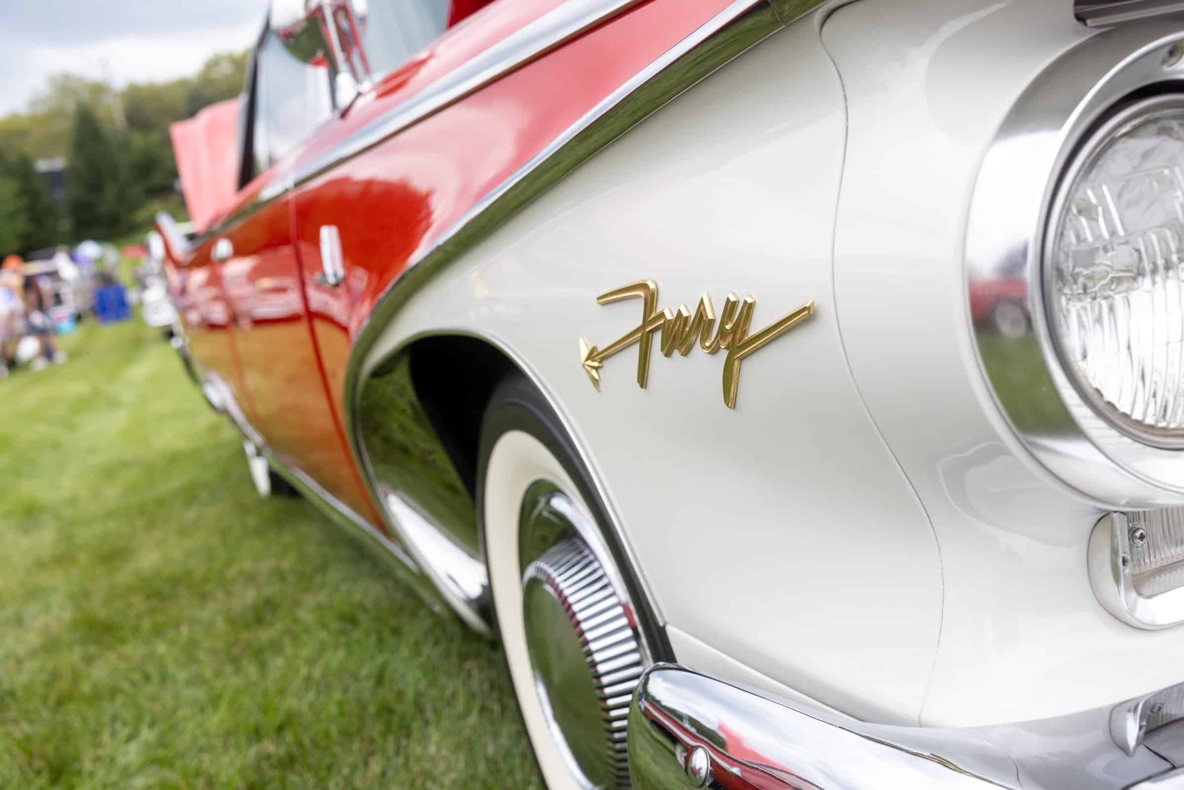 Plymouth Fury - badge, fin and headlight